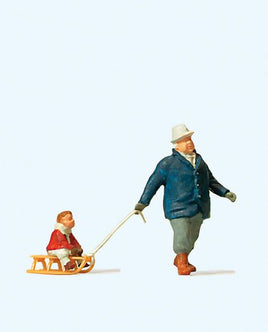 PREISER # 28078 - 'MAN TOWING SLED WITH CHILD' - 1:87/HO SCALE
